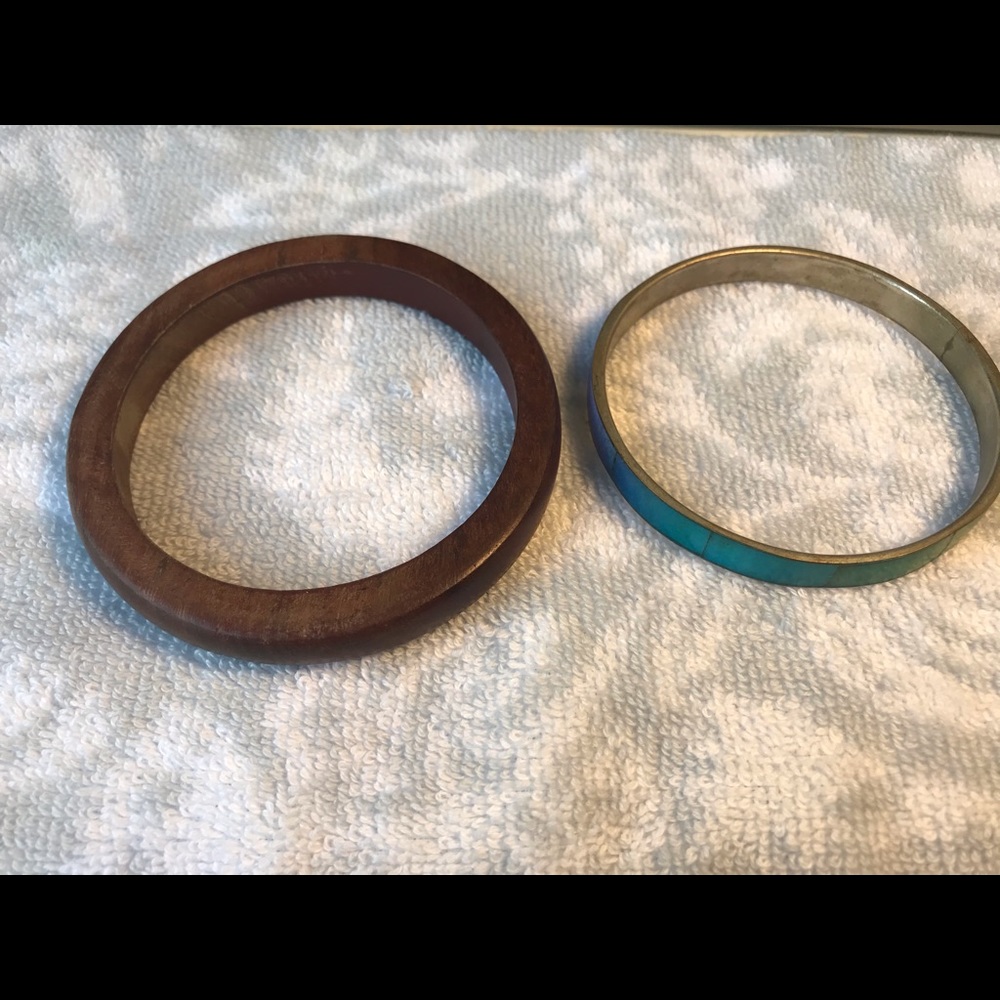 One wooden bracelet and one ombré bracelet.